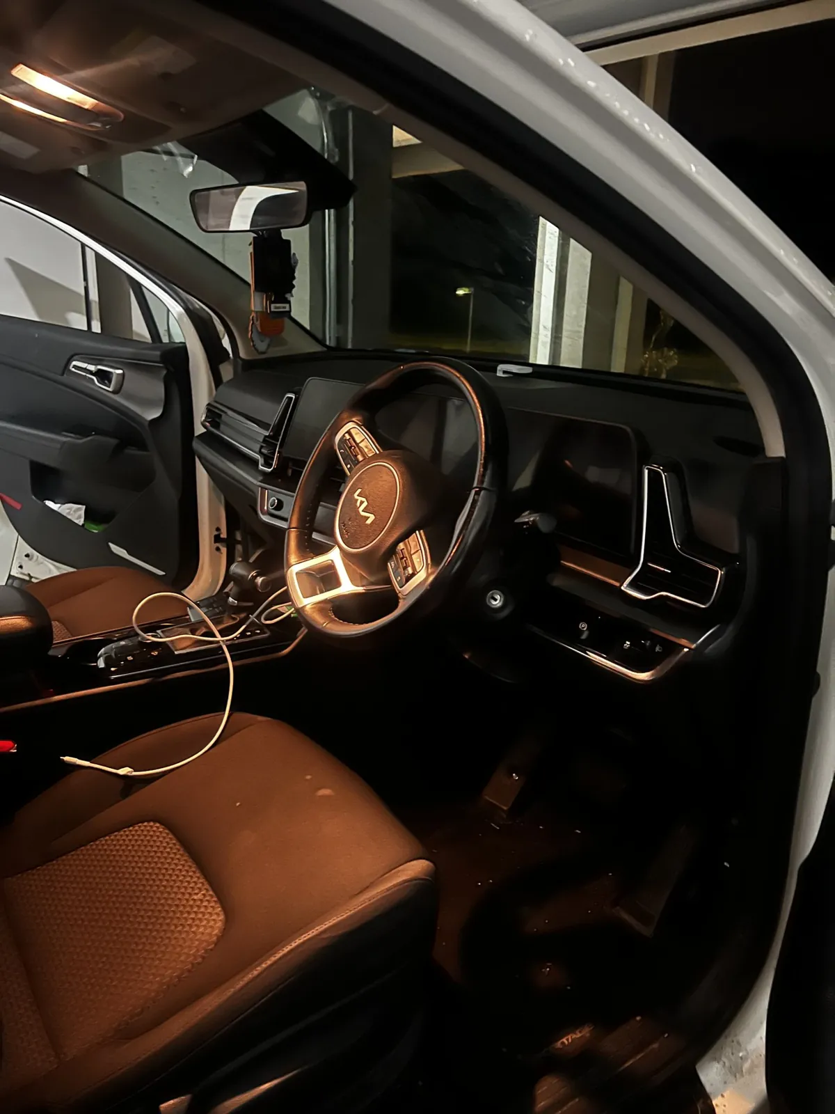 Detailed ute cabin with tan leather seats and clean dash