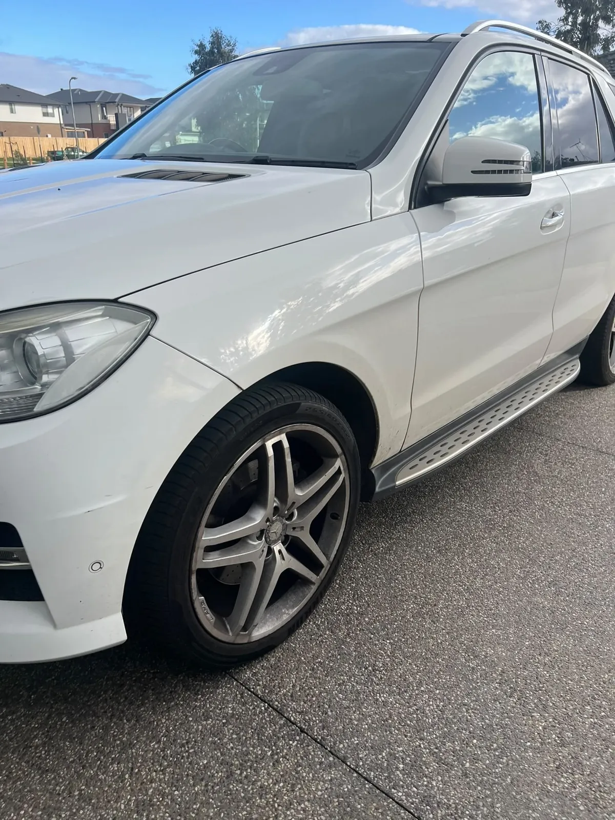 White Mercedes-Benz ML SUV detailed inside and out on a Melbourne driveway at sunset