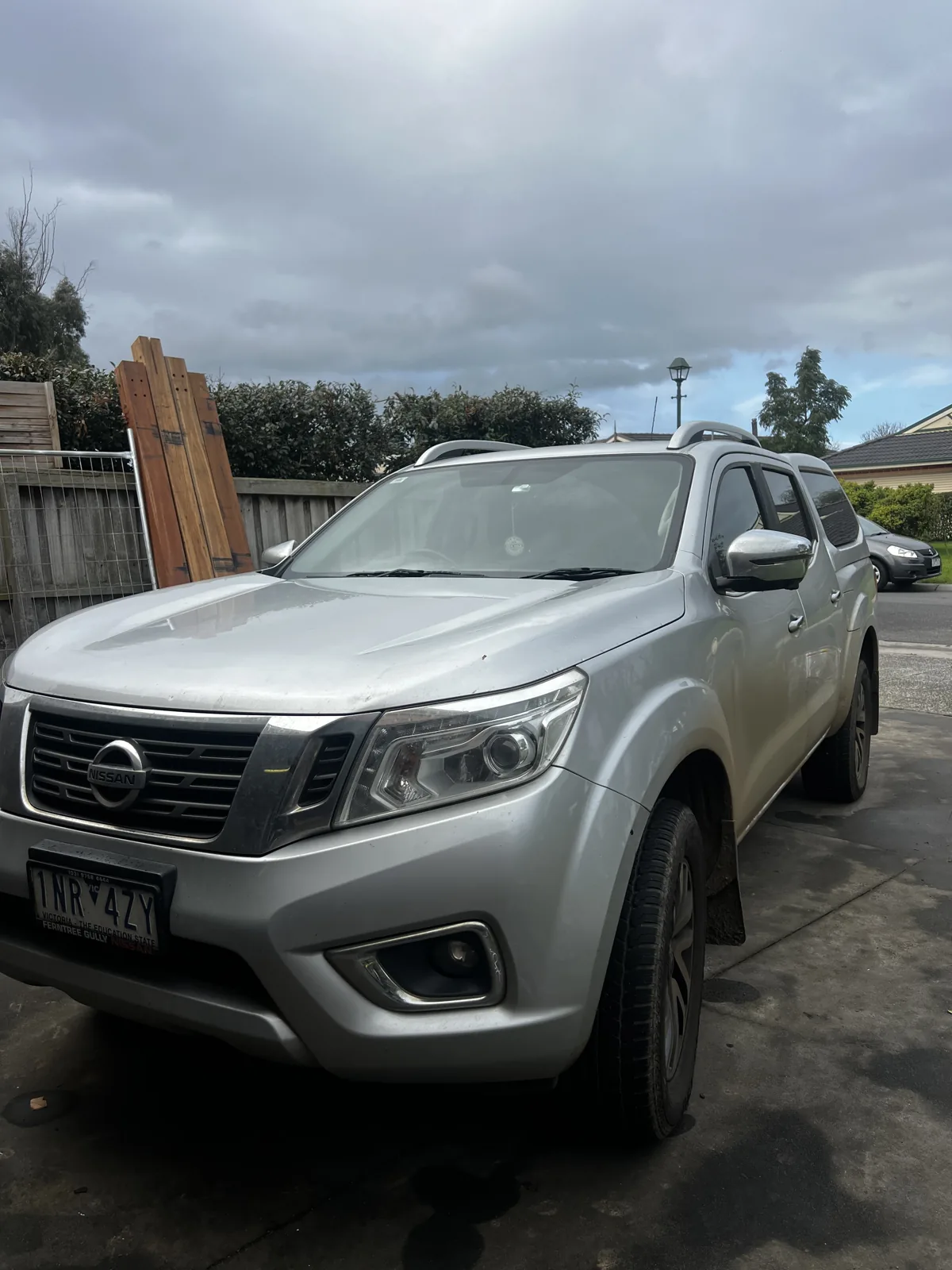 Dusty silver Nissan Navara before a mobile detail in Melbourne's South East