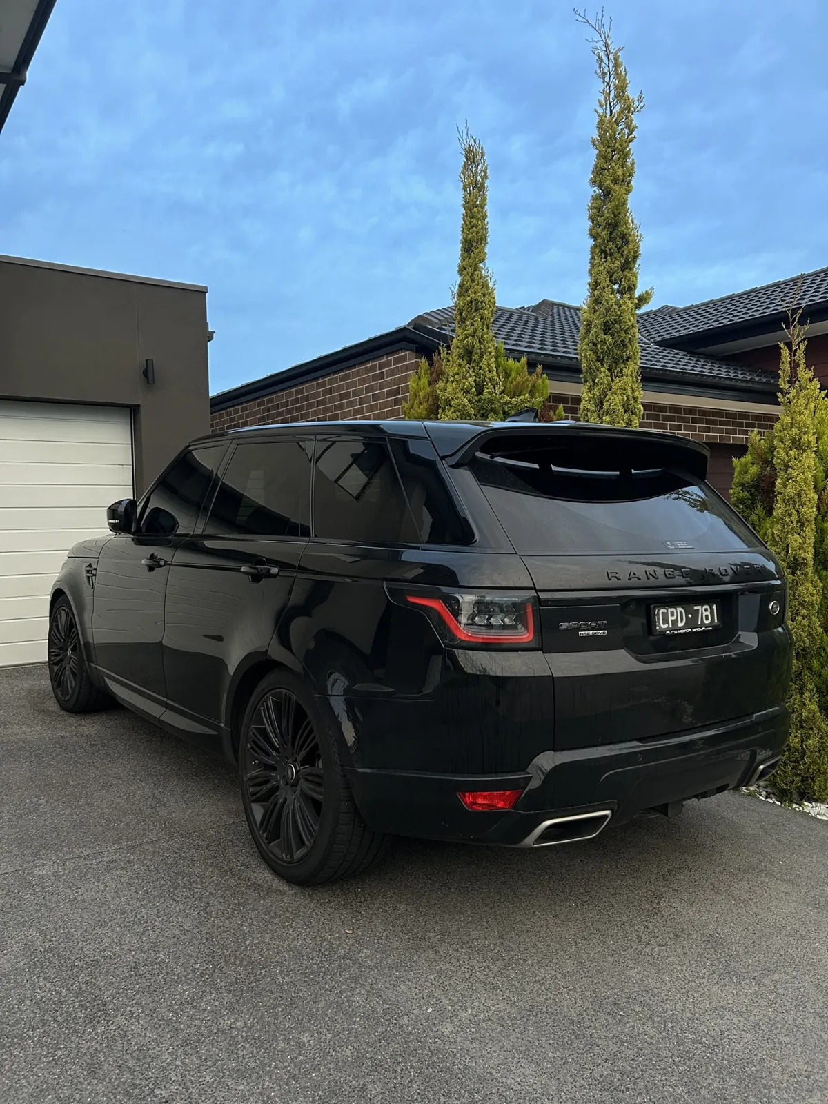 Black Range Rover Sport rear three-quarter after detailing